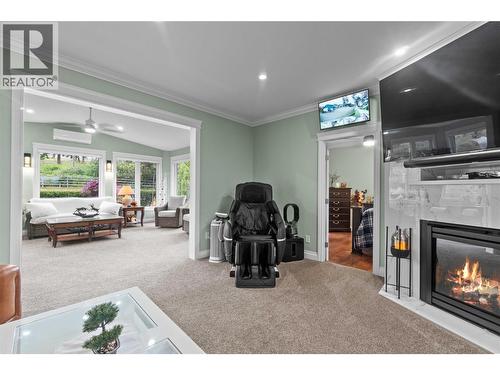 4911 Malpass Road, Armstrong, BC - Indoor Photo Showing Living Room With Fireplace