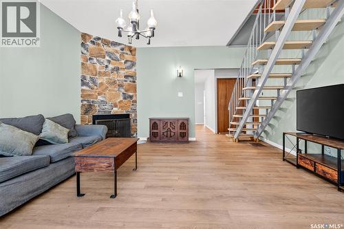 440 Hochelaga Street W, Moose Jaw, SK - Indoor Photo Showing Other Room With Fireplace