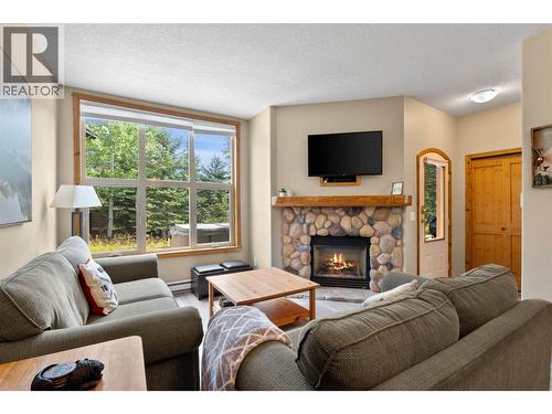 6005 Valley Drive Unit# 68, Sun Peaks, BC - Indoor Photo Showing Living Room With Fireplace
