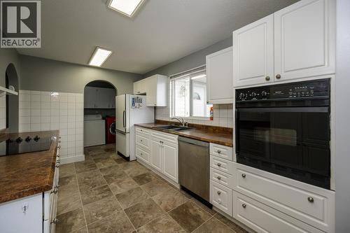 8230 Peter Road, Prince George, BC - Indoor Photo Showing Kitchen With Double Sink