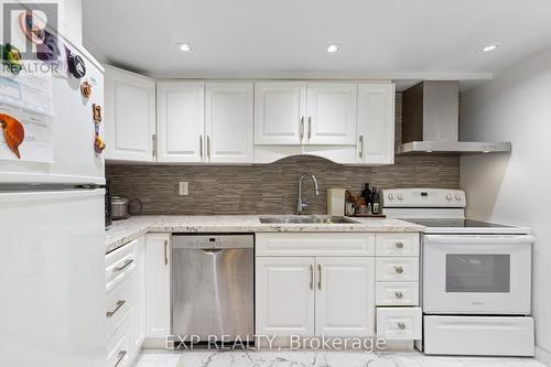 707 - 25 Fairview Road W, Mississauga, ON - Indoor Photo Showing Kitchen With Double Sink