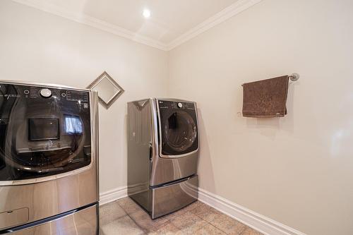 Salle de lavage - 388 Rue Du Colibri, Rosemère, QC - Indoor Photo Showing Laundry Room