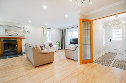Salon - 388 Rue Du Colibri, Rosemère, QC - Indoor Photo Showing Living Room With Fireplace