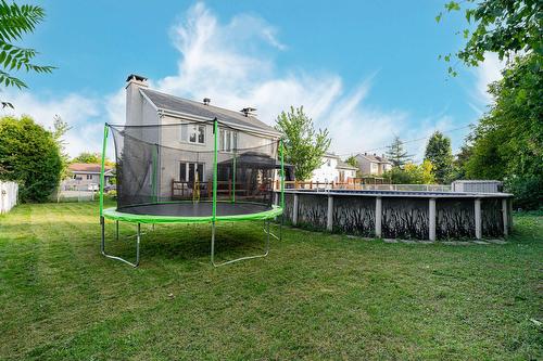Cour - 388 Rue Du Colibri, Rosemère, QC - Outdoor With Above Ground Pool