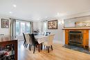 Salle à manger - 388 Rue Du Colibri, Rosemère, QC  - Indoor Photo Showing Dining Room With Fireplace 