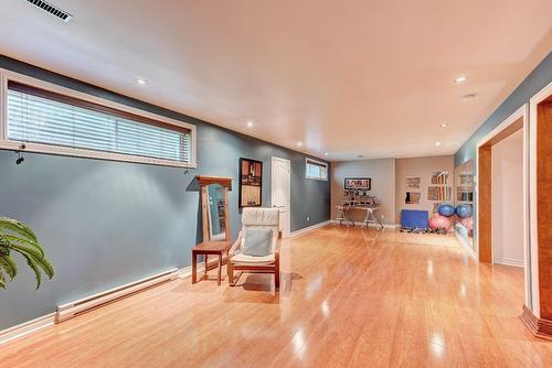 Salle de jeux - 122 Rue Jean-De Ronceray, Carignan, QC - Indoor Photo Showing Other Room