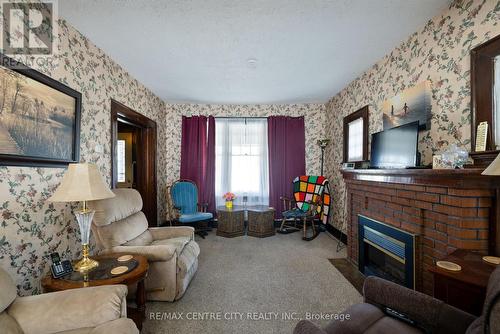 14 James Street, Strathroy-Caradoc (Nw), ON - Indoor Photo Showing Living Room With Fireplace