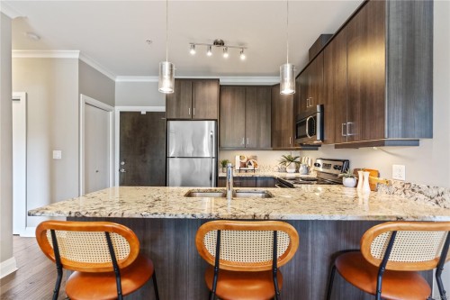 101-1145 Sikorsky Rd, Langford, BC - Indoor Photo Showing Kitchen With Stainless Steel Kitchen With Double Sink With Upgraded Kitchen