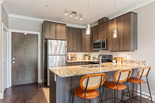 101-1145 Sikorsky Rd, Langford, BC - Indoor Photo Showing Kitchen With Stainless Steel Kitchen With Double Sink With Upgraded Kitchen