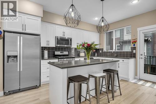 2490 Tuscany Drive Unit# 24, West Kelowna, BC - Indoor Photo Showing Kitchen With Stainless Steel Kitchen With Upgraded Kitchen