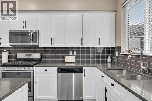 2490 Tuscany Drive Unit# 24, West Kelowna, BC - Indoor Photo Showing Kitchen With Stainless Steel Kitchen With Double Sink With Upgraded Kitchen