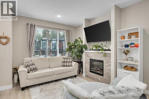 2490 Tuscany Drive Unit# 24, West Kelowna, BC - Indoor Photo Showing Living Room With Fireplace