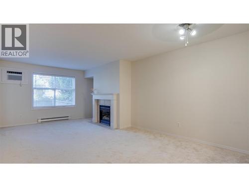 555 Houghton Road Unit# 115, Kelowna, BC - Indoor With Fireplace