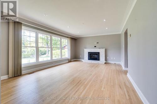7079 Second Line W, Mississauga, ON - Indoor Photo Showing Living Room With Fireplace