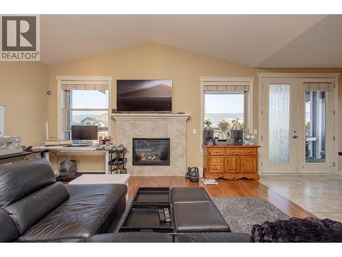 1767 Capistrano Peaks Crescent, Kelowna, BC - Indoor Photo Showing Living Room With Fireplace