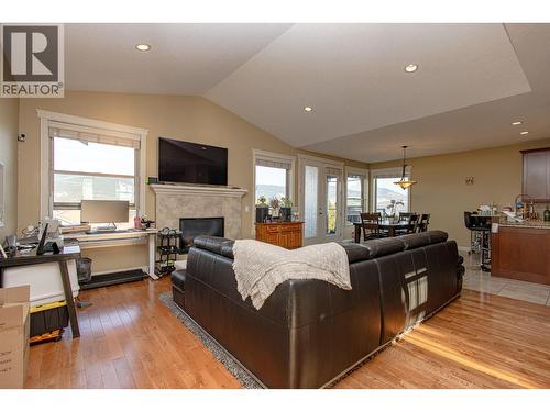 1767 Capistrano Peaks Crescent, Kelowna, BC - Indoor Photo Showing Living Room With Fireplace