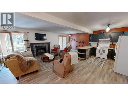 4850 Mckay Street Unit# 2, Radium Hot Springs, BC - Indoor Photo Showing Living Room With Fireplace