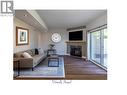 310 Yorkton Avenue Unit# 1, Penticton, BC  - Indoor Photo Showing Living Room With Fireplace 