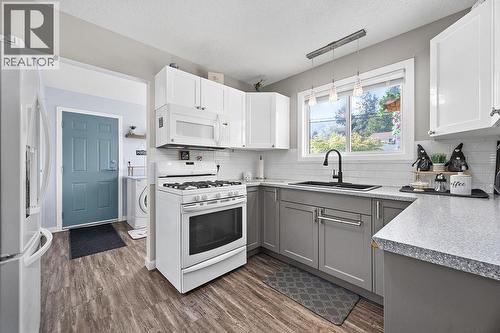 11701 Coldstream Creek Road, Coldstream, BC - Indoor Photo Showing Kitchen With Double Sink