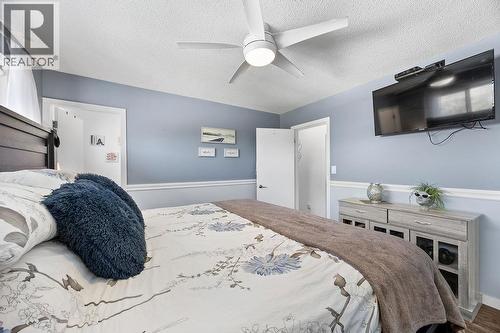 11701 Coldstream Creek Road, Coldstream, BC - Indoor Photo Showing Bedroom