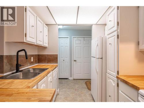 updated Kitchen - 1801 32 Street Unit# 203, Vernon, BC - Indoor Photo Showing Kitchen With Double Sink