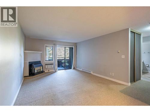 1801 32 Street Unit# 203, Vernon, BC - Indoor With Fireplace