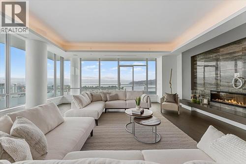 1181 Sunset Drive Unit# 2801, Kelowna, BC - Indoor Photo Showing Living Room With Fireplace