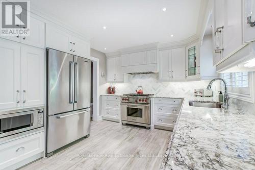 Completely renovated Kitchen - 2139 Brays Lane, Oakville (Ga Glen Abbey), ON - Indoor Photo Showing Kitchen With Upgraded Kitchen