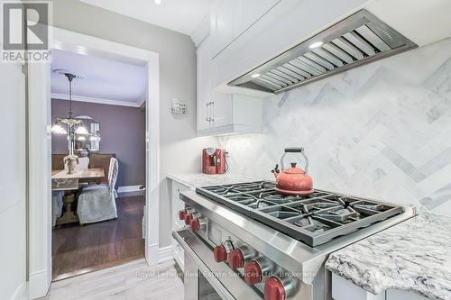 Wolf six burner range - 2139 Brays Lane, Oakville (Ga Glen Abbey), ON - Indoor Photo Showing Kitchen With Upgraded Kitchen