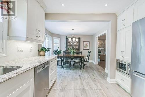 Family sized Kitchen - 2139 Brays Lane, Oakville (Ga Glen Abbey), ON - Indoor Photo Showing Kitchen With Upgraded Kitchen