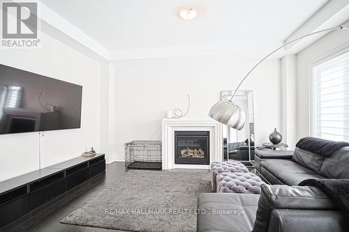Family Room - 25 Kentledge Avenue, East Gwillimbury, ON - Indoor Photo Showing Living Room With Fireplace