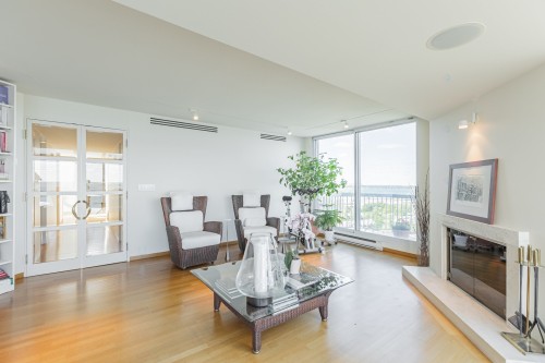 Laundry room - Ph2-3-30 Rue Berlioz, Montréal (Verdun/Île-Des-Soeurs), QC - Indoor Photo Showing Living Room With Fireplace