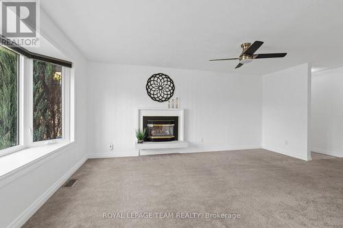 Gas fireplace for those chilly Ottawa winters. - 3 Domus Crescent, Ottawa, ON - Indoor With Fireplace