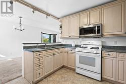 Double sink overlooks the main living area - 