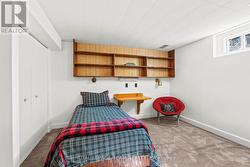 Potential 4th bdrm w/ B/I shelving - 