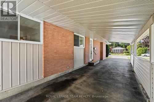 Extended carport easilallows for 2 vehicles. - 3 Domus Crescent, Ottawa, ON -  With Exterior