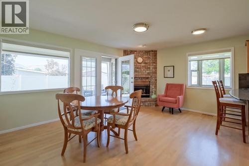 3333 South Main Street Unit# 143, Penticton, BC - Indoor Photo Showing Dining Room With Fireplace