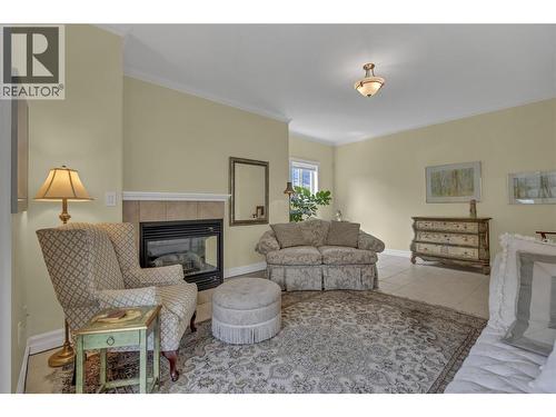 1078 Burnaby Avenue Unit# 105, Penticton, BC - Indoor Photo Showing Living Room With Fireplace