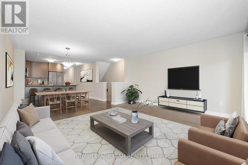 Photo is virtually staged. - 634 Danaca Private, Ottawa, ON - Indoor Photo Showing Living Room