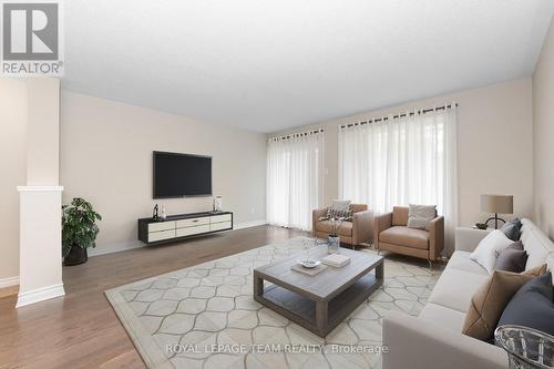 Photo is virtually staged. - 634 Danaca Private, Ottawa, ON - Indoor Photo Showing Living Room