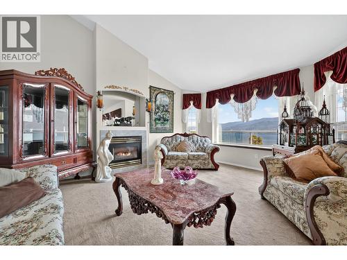 5220 Sutherland Road, Peachland, BC - Indoor Photo Showing Living Room With Fireplace
