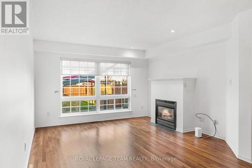 30 Goldthorpe Private, Ottawa, ON - Indoor Photo Showing Living Room With Fireplace