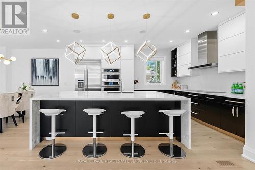 Enjoy a Dramatic Waterfall Island w/Breakfast Bar - 396 River Side Drive, Oakville, ON - Indoor Photo Showing Kitchen With Upgraded Kitchen