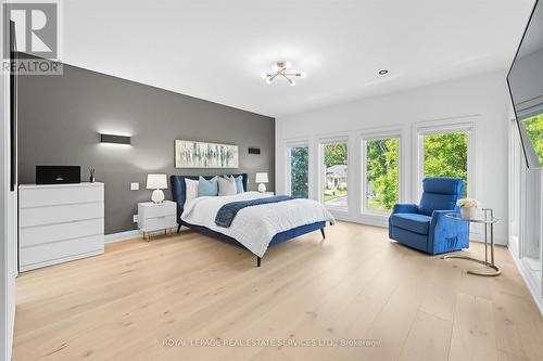 The Primary Bedroom Features Expansive Windows - 396 River Side Drive, Oakville, ON - Indoor Photo Showing Bedroom