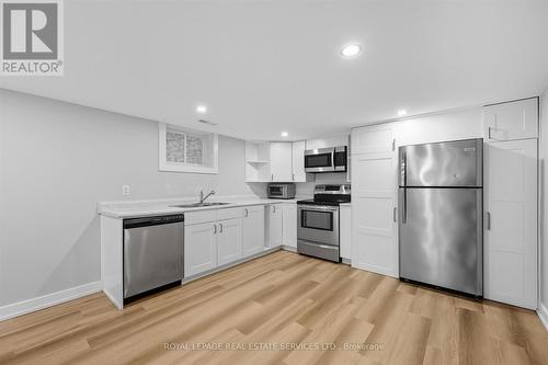The Second Kitchen is Open to Living/Dining Area - 396 River Side Drive, Oakville, ON - Indoor Photo Showing Kitchen