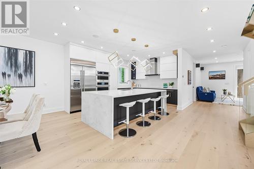 Dream Kitchen Features a Dramatic Waterfall Island - 396 River Side Drive, Oakville, ON - Indoor