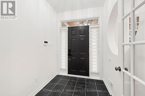 Foyer opens with double French doors - 60 Ironside Court, Ottawa, ON - Indoor Photo Showing Other Room