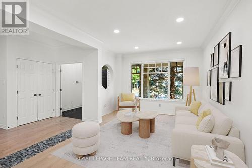 This living room has been virtually staged - 60 Ironside Court, Ottawa, ON - Indoor Photo Showing Living Room