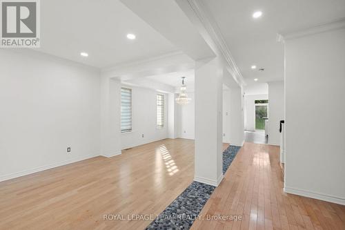 Refinished hardwood and stone flooring accents - 60 Ironside Court, Ottawa, ON - Indoor Photo Showing Other Room