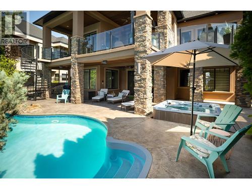 710 Arbor View Drive, Kelowna, BC - Outdoor With In Ground Pool With Deck Patio Veranda